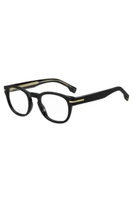 Montura para gafas graduadas de acetato negro con detalle dorado de la marca