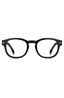 Montura para gafas graduadas de acetato negro con detalle dorado de la marca