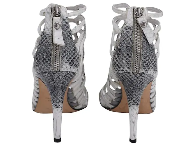 Sandalias Strappy Loops Stuart Weitzman en cuero gris con estampado de pitón 